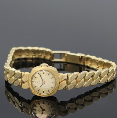TISSOT Damenarmbanduhr in GG 585/000, Schweiz um 1970, Handaufzug, 2-teil. viereckiges Geh. m. angesetzt. Gold- Gliederband m. Klappschl., gold. ...