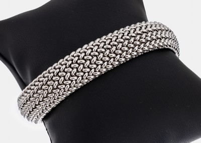 14 kt Gold Armband, GG/WG 585/000, flexibelgearbeitet, L. ca. 20 cm, Kastenschloss, ca. 33.0 g