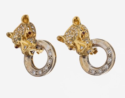 Paar 18 kt Gold Rubin-Brillant-Ohrclips "Raubtier", GG/WG 750/000, 4 rundfacett. Rubine als Augen zus. ca. 0.04 ct, 70 Brillanten zus. ca. ...