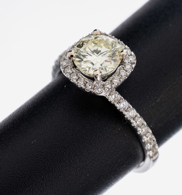 18 kt Gold Brillant-Ring, WG/GG 750/000, Brillant ca. 1.05 ct natural fancy yellow/vs, 36 Brillanten zus. ca. 0.40 ct Weiß/vs, RW 54,ca. 3.1 g