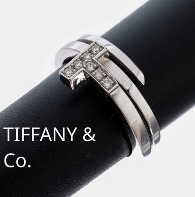 18 kt Gold TIFFANY & CO Brillant-Ring, WG 750/000, Modell Atlas, 7 Brillanten zus. ca. 0.10 ct feines Weiß-Weiß/vs, RW 57, ca. 8.6 g