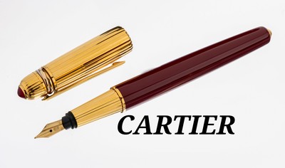 CARTIER Füllfederhalter, "Pasha de Cartier", Paris 1990 , Korpus burgunderfarb. Hartlack,Kappe Metall verg., Rillendekor, Feder GG ...