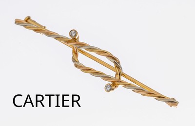 18 kt Gold CARTIER Brillant-Brosche, 1950er -60er Jahre, GG/WG 750/000, Rope Twist, gedrehte GG und WG-Drähte, 2 Brillanten zus. ca. 0.03 ct feines ...