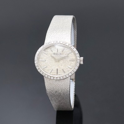SARCAR Damenarmbanduhr in WG 585/000, Schweiz um 1965, Handaufzug, ovales Geh. inkl. SEIKO Goldband m. Klappschl., Boden aufgedr., Lünette m. ...