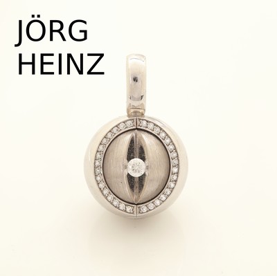 18 kt Gold JÖRG HEINZ Brillant-"Magic Pendant", WG/GG 750/000, pol., Innenkugel drehbar, 1 x WG pol. mit Brillant ca. 0.15 ct feines ...