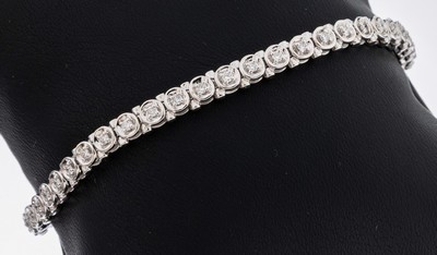 14 kt Gold Brillant-Armband, WG 585/000, 46Brillanten zus. ca. 0.46 ct Weiß/si, L. ca. 19cm, Kastenschloss mit Sicherheitsacht, ca. 16.8 g