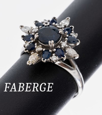 18 kt Gold FABERGE Saphir-Diamant-Ring, WG 750/000, Modell Polarstern, FABERGE NEW YORK, mittig rundfacett. Saphir ca. 1.0 ct, 8 facett. ...