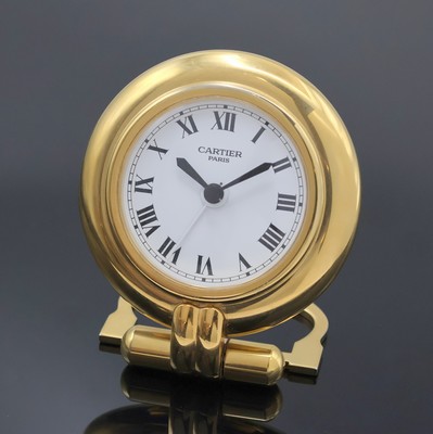 CARTIER Colisee Tischwecker, Schweiz um 1990, quarz, verg. aufstellbares Gehäuse, weißes Zifferbl. m. röm. Zahlen, schwarze Zeiger, Bedienung und ...