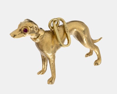 14 kt Gold Anhänger, GG 585/000, plastischer Windhund, Augen 2 rundfacett. Rubine, wohl Synthesen, ca. 4.5 g, ca. 3 x 2 cm