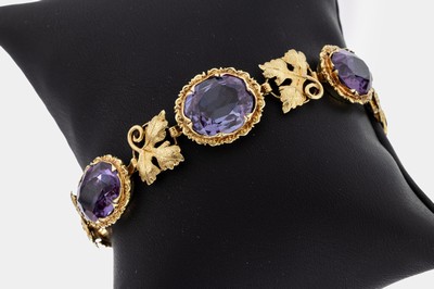 14 kt Gold Farbstein-Armband, 1960er Jahre, GG 585/000, 5 ovalfacett. synth. Korunde, Zwischenglieder mit Weinlaubdekor, L. ca. 18 cm, Kastenschloss ...