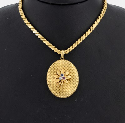 18 kt Gold Brillant-Saphir-Rubin- Medaillonanhänger, GG 750/000 gepr., Deckel mit Flechtmuster, aufgelegte Blüte mit 1 Brillant ca. 0.05 ct ...