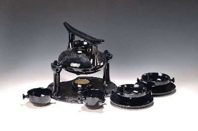 Teeservice "Zen", Luigi Colani (1928-2019) für Porzellanfabrik Friesland, Entw. von 1974, Ceracron, blau-schwarz glasiert, 9 Tassen mit ...