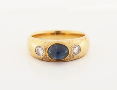 18 kt Gold Saphir-Brillant-Ring, GG 750/000, klassischer Bandring, ovaler Saphir- Cabochon ca. 1.30 ct, 2 Brillanten zus. ca. 0.20 ct Weiß/si, RW ...