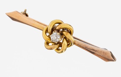 14 kt Gold Diamant-Brosche, GG 585/000, länglich, knotenf. Mittelteil mit Altschliffdiamant ca. 0.12 ct Weiß/si, L. ca. 4 cm, ca. 3.0 g