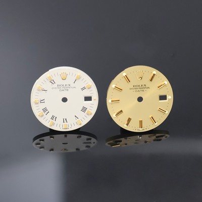 ROLEX 2 Damenarmbanduhr-Zifferblätter für das Modell Oyster Perpetual Date, 1x champagnerfarb., 1x weißes Zifferbl., beide aufges. Std.-Ind. u. ...
