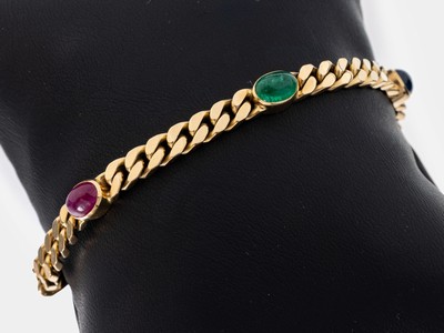14 kt Gold Farbstein-Armband, GG 585/000, 2Rubin-, 2 Saphir- und 1 Smaragd-Cabochons, zus. ca. 8.0 ct, L. ca. 19 cm, Kastenschloss mit ...