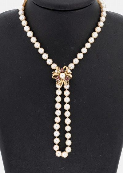 14 kt Gold Rubin-Kettenverkürzer, GG 585/000, mittig kl. Zuchtperle, 9 rundfacett. Rubine zus. ca. 0.25 ct, ca. 6.2 g, an Zuchtperlenkette, endlos, ...