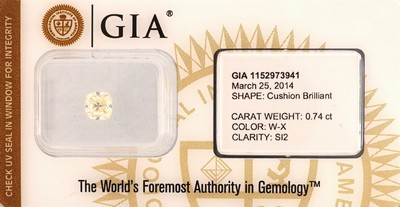 Loser Diamant, 0.74 ct Light Yellow (W-X)/si2,Kissenschliff, verschweißt, GIA-Expertise