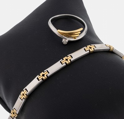 18 kt Gold und Platin Schmuckset, GG 750/000 und Pt., best. aus: 1 Ring, RW 54, Brillant ca. 0.06 ct Weiß/p1, lt. beiliegendemZertifikat, und 1 ...