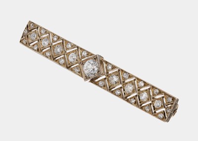 14 kt Gold Art Deco Diamant-Brosche, Österreich/Wien, 1925-30, GG/WG 585/000, geometrisch, durchbrochen gearbeitet, 31 Altschliffdiamanten zus. ca. ...