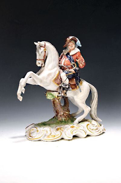 Große Porzellanfigur, Unterweissbach, 20. Jh., Landsknecht zu Pferd, bunt bemalt, ein Vorderbein geklebt, ein Ohr min. best., H. ca. 29.5cm