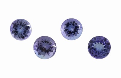 Lot 4 lose Tansanite, zus. ca. 4.40 ct, rundfacett. in versch. Größen und Farbnuancen