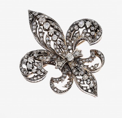 Prunkvolle 18 kt Gold Diamant-Brosche, wohl Frankreich, um 1900, GG 750/000 gepr., schauseitig zeittyp. Silber, Darstellung der Fleur-de-Lys, ...