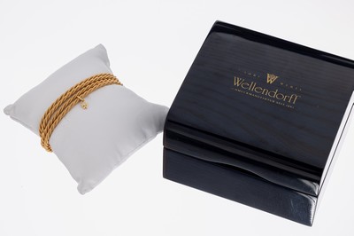 18 kt Gold WELLENDORFF Armband, GG 750/000,Modell Silky Quartett, 4-rhg., fein sat. und z.T. pol., typ. W- Abhängung mit Brillant 0.02 ct feines ...