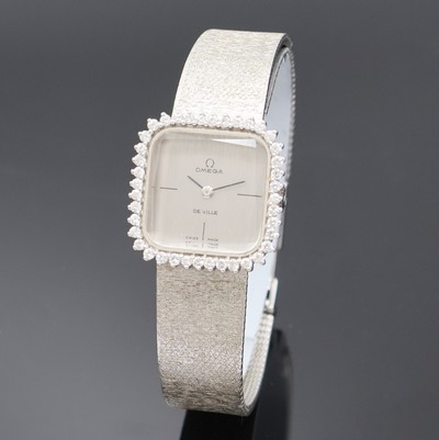 OMEGA De Ville Damenarmbanduhr in WG 750/000 Referenz 1211, Handaufzug, Schweiz um 1969, 2-teil. Geh. inkl. orig. Milanaiseband, Boden aufgedr., ...
