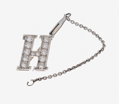 14 kt Gold Brillant-Anstecknadel, WG 585/000 unterlegiert, Darstellung Buchstabe H,12 Brillanten zus. ca. 1.0 ct feines Weiß- Weiß/vs-si, ca. 3.1 ...