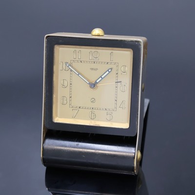 JAEGER 2-Tage Reisewecker, Schweiz um 1940, schwarz lack. Metallgeh. berieb., aufstellbar durch Drehung des Glasschutzes, gold. Zifferbl., arab. ...