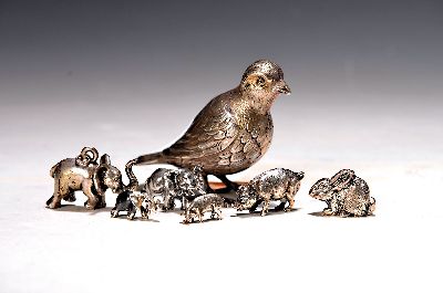 7 Tierfigurinen aus Silber, 20.Jh., 825-935er Silber, Singvogel, 3 unterschiedlich große Elefanten, 2 Schweine, ein Hase, ges. ca. 170g