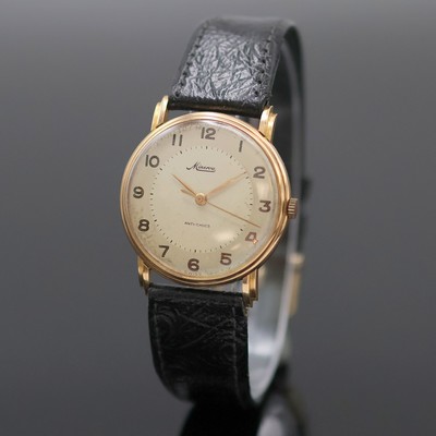 MINERVA Armbanduhr in RG 750/000 mit Kaliber 49, Schweiz um 1955, Handaufzug, Boden aufgedr., silb. Zifferbl. pat./fl., arab. Zahlen, gold. Zeiger, ...