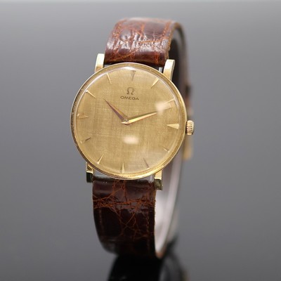 OMEGA Armbanduhr in GG 750/000 Referenz 14372/14376, Schweiz um 1960, Handaufzug, Boden u. Glasrand aufgedr., neutr. Lederband m. orig. verg. ...