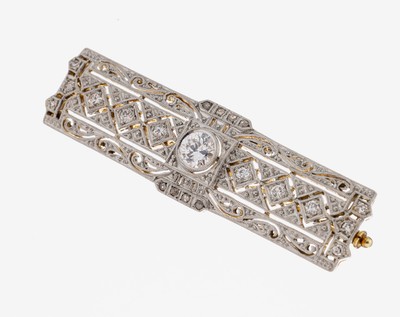 14 kt Gold Art Deco Diamant-Brosche, um 1925 -30, GG 585/000 gepr., schauseitig Platin, qualitätvolle Verarbeitung, durchbrochen gearbeitet, mittig ...