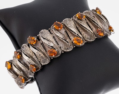 Ausgefallenes Citrin-Armband, 1950er-60er Jahre, 925er Silber, abstrakte Glieder, 21 ovalfacett. Citrine in versch. Farbnuancen, L.ca. 18.5 cm, ...