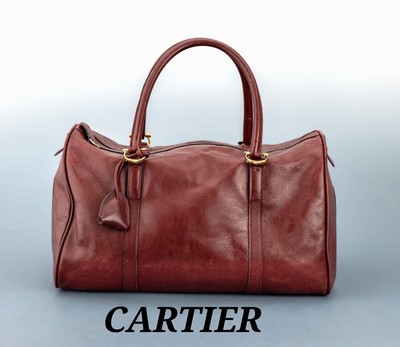 CARTIER Weekender, bordeaux farbenes Leder, Made in Italy, Innenfutter bordeauxf. Stoff, (verschmutzt), 1 x Seitentasche mit Reißverschluß, 2 ...