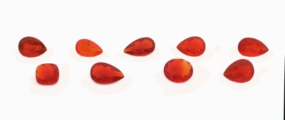 Konvolut 9 Feueropale, zus. ca. 8.8 ct, 1x ovalfacett., 1x Cushion Cut, 7x facett. Tropfen, in versch. Größen