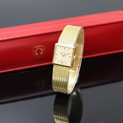 OMEGA viereckige Armbanduhr in GG 750/000 Referenz 8068, Schweiz um 1968, Handaufzug, orig. Goldband, Boden aufgedr., silb. Zifferbl. m. aufges. ...