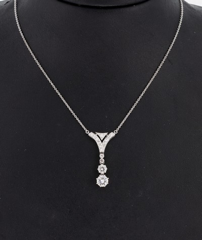 14 kt Gold Diamant-Collier, WG 585/000, Mittelteil bewegl., 1 Brillant 0.72 ct Weiß/ vs-si, 1 Brillant 0.32 ct Weiß/si, 13 8/8- Diamanten zus. ca. ...