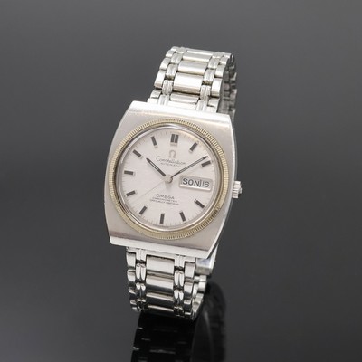 OMEGA Constellation Herrenarmbanduhr in Stahl/WG Referenz 168.041, Schweiz um 1969, Automatik, tonneauförmiges Geh. m. geriffelter WG Lünette, im ...