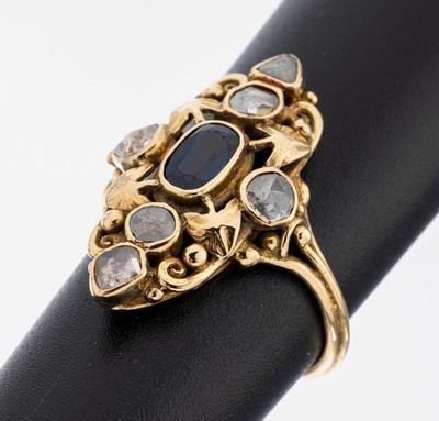18 kt Gold Saphir-Diamant-Ring, um 1880/90, GG 750/000 gepr., ovalfacett. Saphir ca. 0.80 ct, 6 Diamantrosen zus. ca. 0.38 ct, zeittyp. verbödet, ...