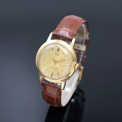 GUB Glashütte SA vergoldete Herrenarmbanduhr, Deutschland um 1960, Handaufzug, Stahlboden verschr., goldfarb. Zifferbl. m. aufges. Std.-Ind. teils ...