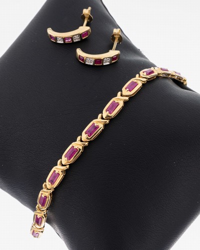 14 kt Gold Rubin-Armband, GG 585/000, 19 Rubinbaguettes (beh.) zus. ca. 3.80 ct, L. ca.18.5 cm, Kastenschloss mit Sicherheitsacht, ca. 6.3 g, dazu 1 ...