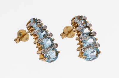 14 kt Gold Topas-Diamant-Ohrstecker, GG 585/000, 10 ovalfacett. Blautopase (beh.) zus.ca. 5.80 ct, 8 8/8-Diamanten zus. ca. 0.04 ct Weiß/p, ca. 4.3 ...