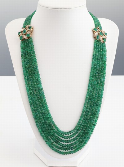 14 kt Gold Smaragd-Brillant-Collier, GG 585/000, mittig 6-rhg. Smaragd-Linsen, 2 Zierelemente, geschwungen, 12 ovale Smaragd- Cabochons zus. ca. ...