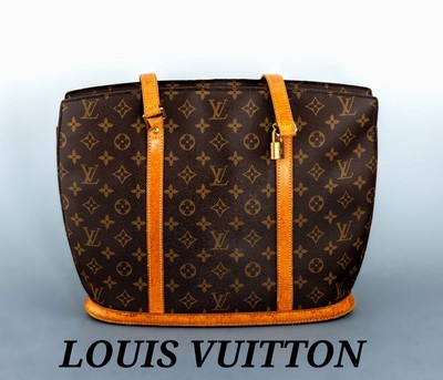 LOUIS VUITTON Tasche, "Babylone Tote Bag", Monogram Canvas, Besätze und 2 Tragehenkel naturfarb. Leder, Monturen Messing verg., innen ...