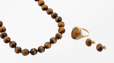 8 kt Gold Tigerauge-Schmuckset, GG 333/000,best. aus: 1 x Ring, ovaler Tigeraugen- Cabochon, RW 57, 1 x Collier, D. ca. 9.8-10.1 mm, endlos, L. ca. ...