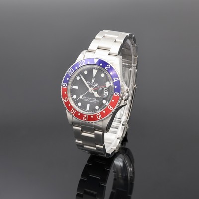 ROLEX Oyster Perpetual GMT-Master Herrenarmbanduhr Referenz 1675, Schweiz um 1977, Automatik, Chronometer der Superlative in Edelstahl inkl. ...