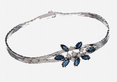 14 kt Gold Saphir-Brillant-Armband, 1970er Jahre, WG 585/000, 7 Saphir-Navettes zus. ca. 1.0 ct, 6 Brillanten zus. ca. 0.18 ct Weiß/si, L. ca. 18 ...